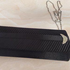 Women's Black and silver clutch purse - slightly used